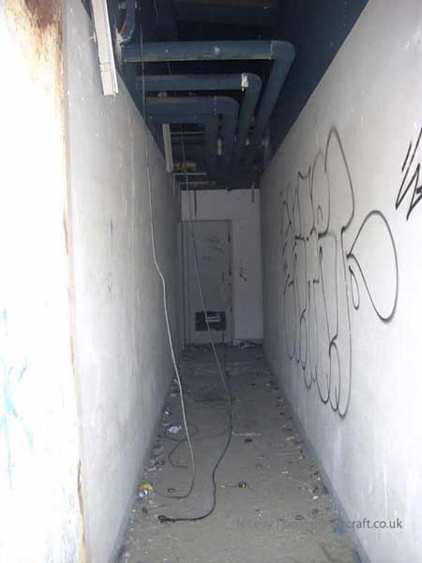 A recce of the derelict buildings of the old Boulogne Hoverport - An access corridor within the building (N Levy).